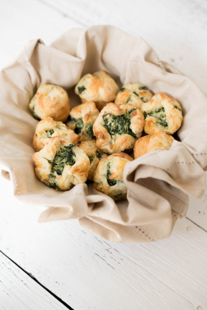 Flaky Puff pastry cups full of chopped spinach and cheese. Perfect for your next party!