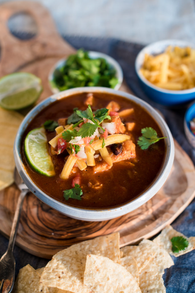 An easy to prepare chicken tortilla soup recipe with fire roasted tomatoes, black beans, and fresh lime juice. Tortilla Soup in less than 30 mins.