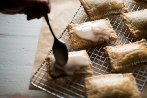 These homemade pop-tarts are flavorful and made with REAL ingredients. I stuck with a homemade pie crust, easy cherry berry jam and light glaze. 