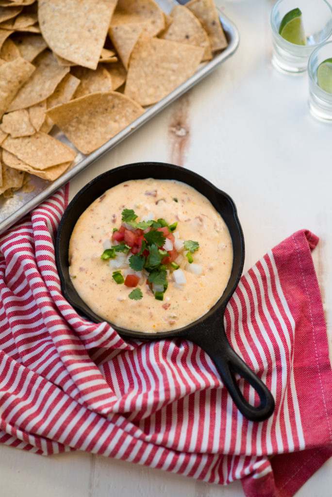 This queso is creamy and rich without the use of Velveeta cheese. Monterrey jack and american cheese are the stars in this Tex-Mex Classic!