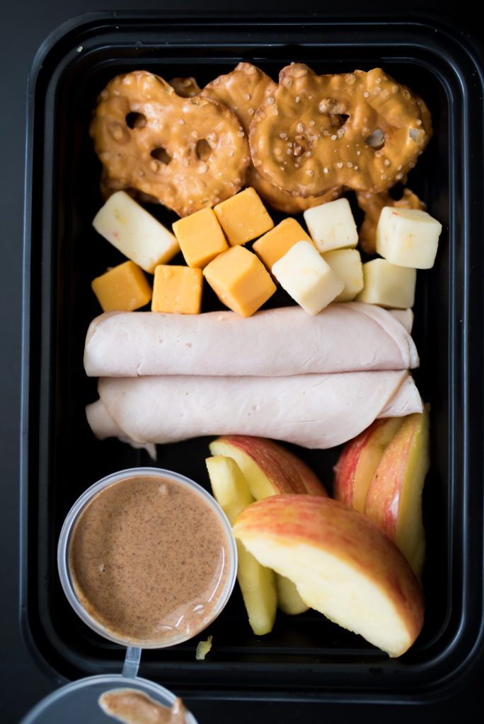 Looking for healthier snack options? Try one of these 4 Healthy Snack Box Ideas. For less than $10 and 30 minutes or less, you can have easy nutritious snack/ lunch boxes waiting ready to enjoy at a moment's notice! 