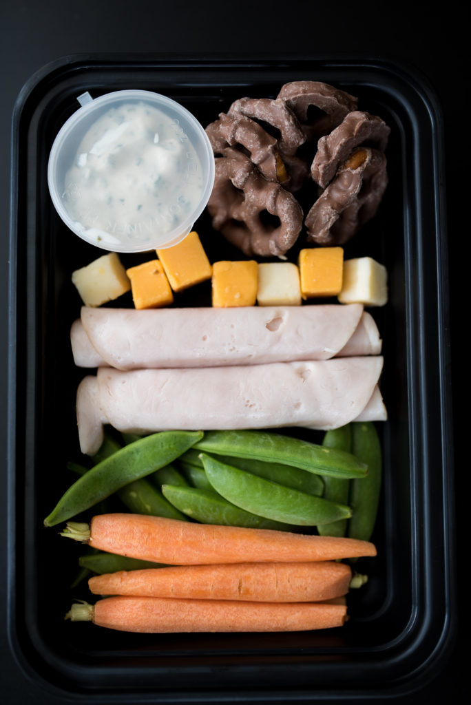 Looking for healthier snack options? Try one of these 4 Healthy Snack Box Ideas. For less than $10 and 30 minutes or less, you can have easy nutritious snack/ lunch boxes waiting ready to enjoy at a moment's notice! 