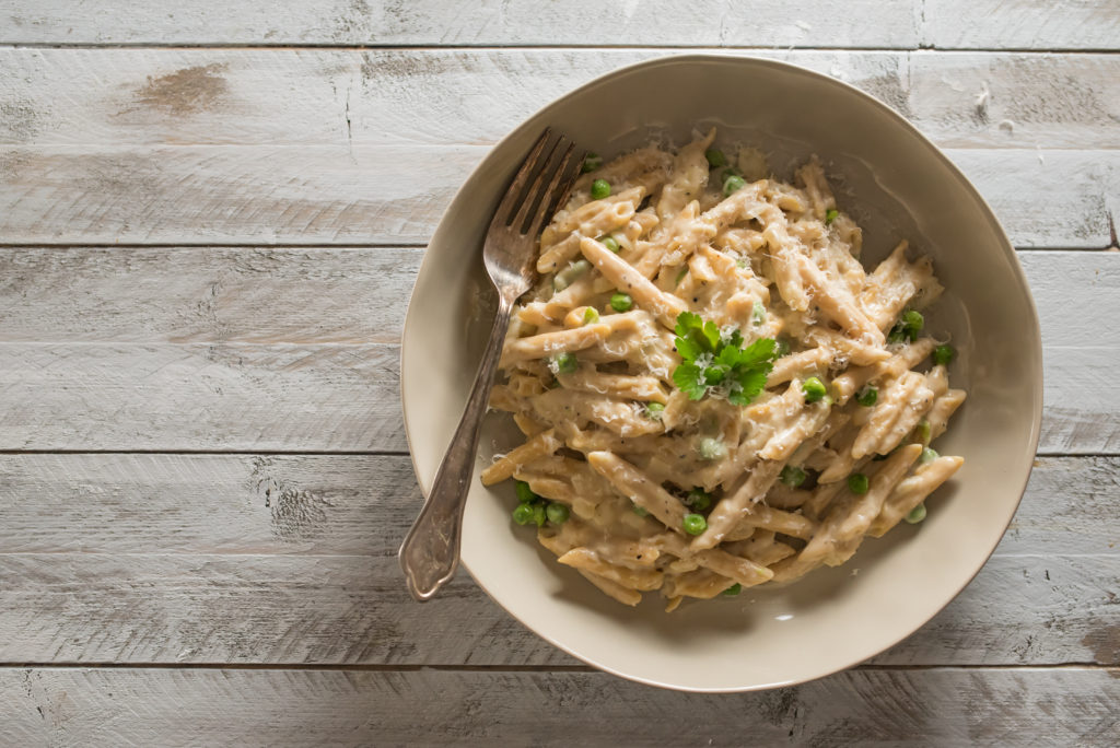 This lentil pasta Alfredo dish has the most delicious sauce: Creamy, cheesy, and well seasoned in less than 30 mins. Great plant based, protein packed meal!