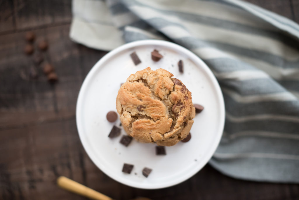 Peanut butter cookies turned up a notch! They are crisp on the outside, still gooey on the inside and stuffed with melty milk chocolate and crushed peanut butter cups. If you can believe it... they're even better when they cool down. | Firstandfull.com