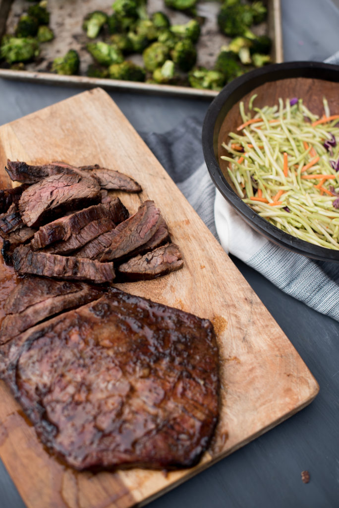 An easy flank steak marinade perfect for weeknight grilling. It's got soy sauce, ginger, garlic, and honey to create the most delicious and tender steak. | FirstandFull.com