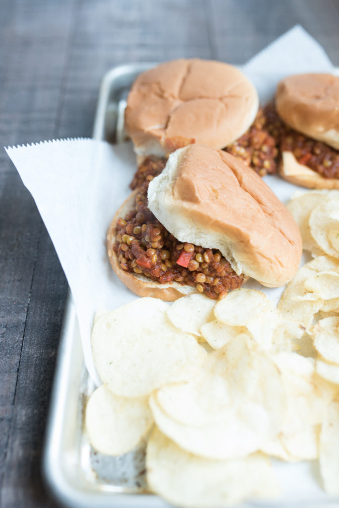 Vegetarian Lentil Sloppy Joes featuring a thick, hearty, and flavorful sauce piled high on hamburger buns! A modern take on the ones from your childhood.