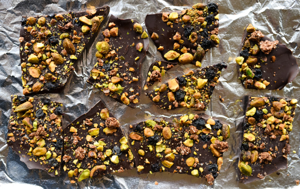 5 minute recipe for Dark Chocolate Pistachio Bark with dried blueberries, tasty pistachios, and crunchy granola. Tips for customization included! | firstandfull.com 