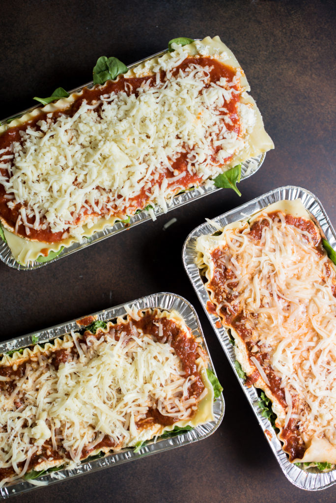 Vegetarian spinach lasagna recipe; layers stuffed with spinach and kale, a savory ricotta, and layered with mozzarella cheese. Make one for the freezer for an easy weeknight meal. 