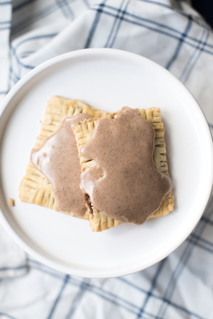 Homemade Brown Sugar Cinnamon Pop-Tarts: A crispy pastry, filled with cinnamon sugar, topped with a delicious sugary glaze. Pop- Tarts for kids + adults! 