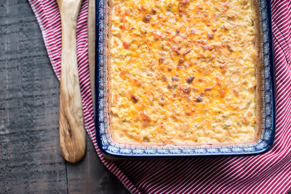 This jalapeno cheesy corn is the perfect side dish for your next BBQ, potluck, or Sunday dinner-- creamy corn with diced jalapenos and sharp cheddar cheese!