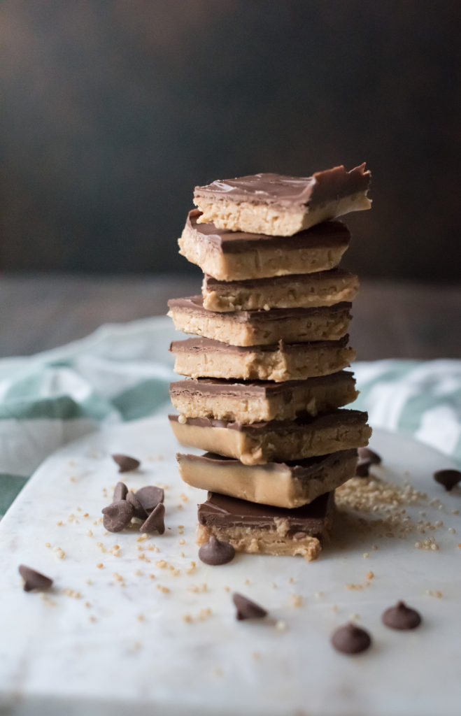 No- bake Peanut Butter Nutella Crunch Bars: Creamy, crunchy peanut butter bars topped with melted milk chocolate swirled with Nutella. 