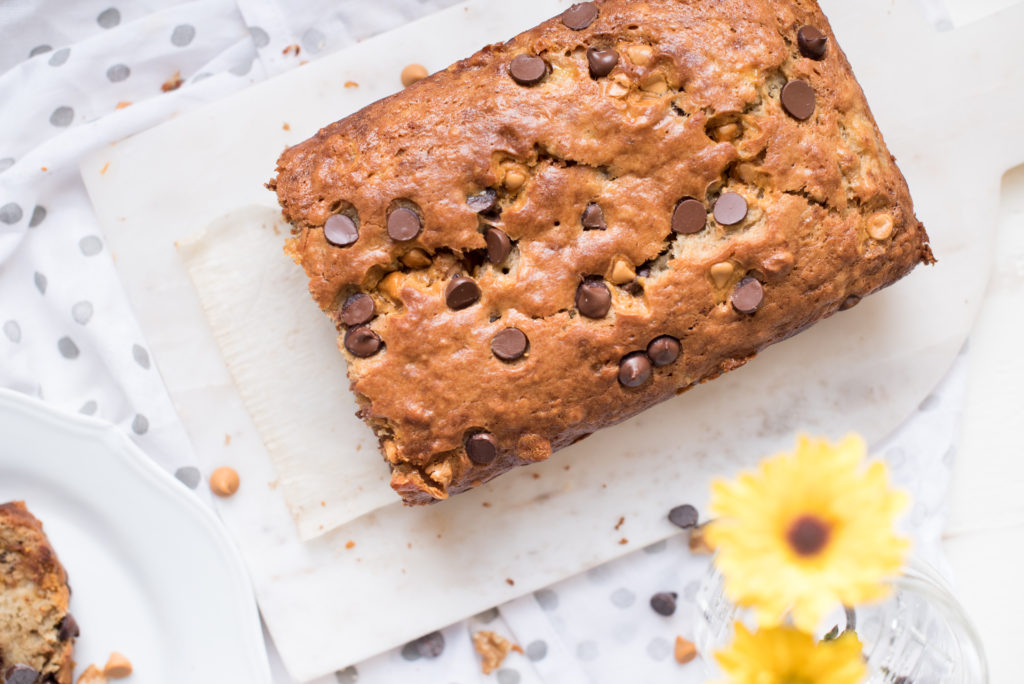 A healthier Zucchini Bread recipe topped with a delicious, crunchy streusel topping. Just sweet enough, moist, and full of flavor-- everyone will love this zucchini bread!