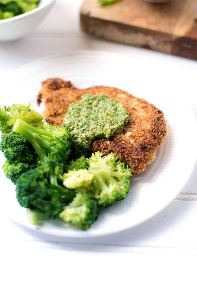 Almond Crusted Chicken Cutlets with Pesto: The nutty flavor from the almonds is slight, but when paired with the garlicky, citrusy pesto it just works! If your family is fond of chicken parmesan, they will adore this recipe for crispy almond crusted chicken and lemon- basil pesto.