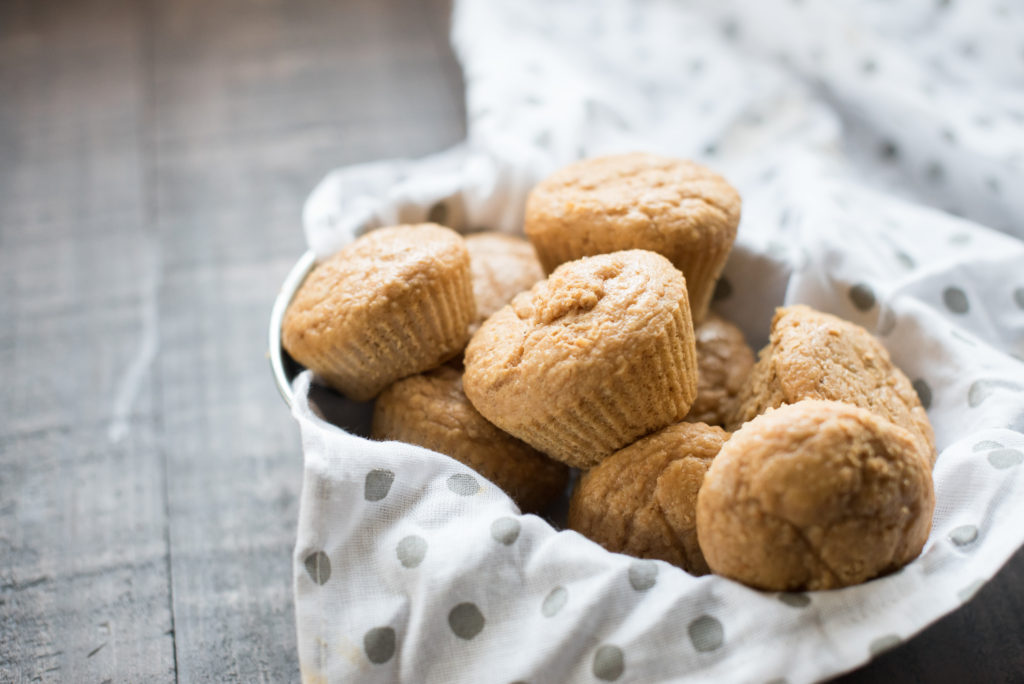 Nutrient dense sweet potato muffins packed with roasted sweet potatoes fortified with old fashioned oats and sweetened with a combination of natural sweeteners! Prefect for breakfast on the go or little picky eaters! 