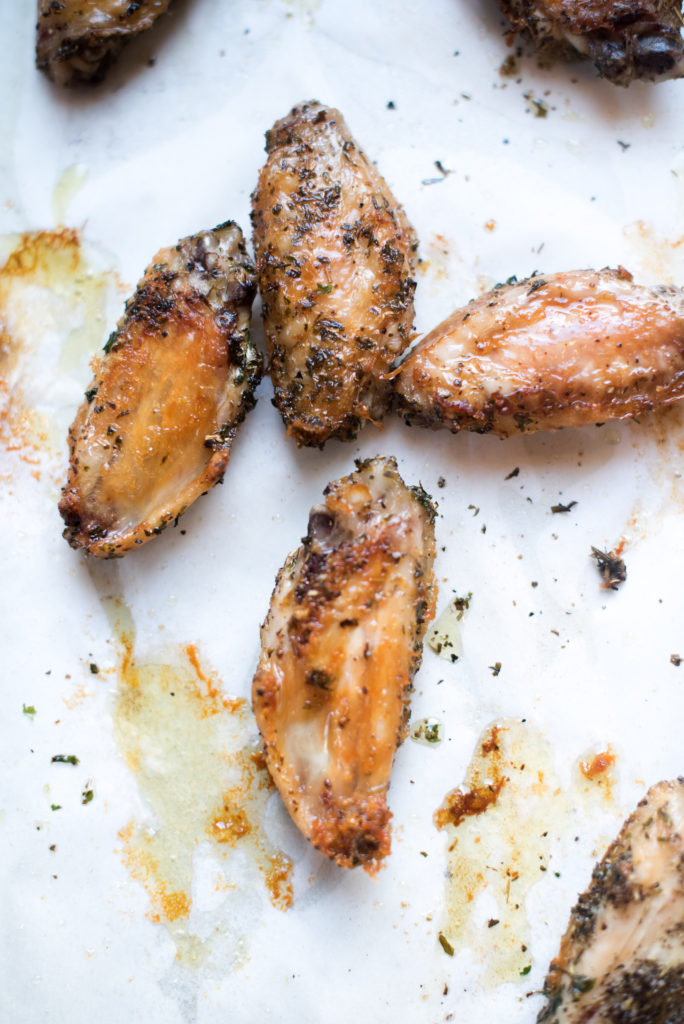 These 5 ingredient Italian Honey Baked Chicken Wings are ridiculously simple but always delicious. These wings are seasoned with Italian seasonings, baked to crispy perfection and tossed with honey at the end for a little added sweetness!