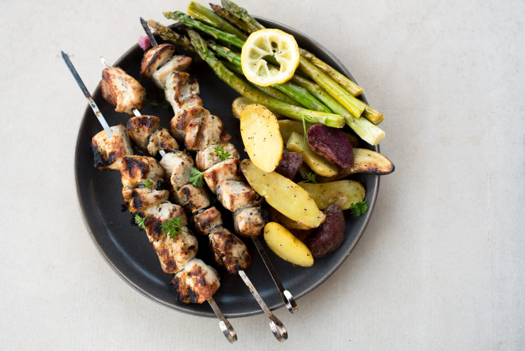 Ranch Grilled Chicken Skewers: Delicious grilled chicken skewers first marinated in a roasted garlic ranch sauce, grilled till juicy, and served with roasted potatoes, and grilled asparagus. A Whole30 Compliant recipe that all your guest will enjoy!